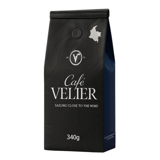 Side view of Cafe VELIER Maestria Watermelon coffee bag, black with a dark blue side panel, displaying 'Colombian Coffee' text and a patterned design.
